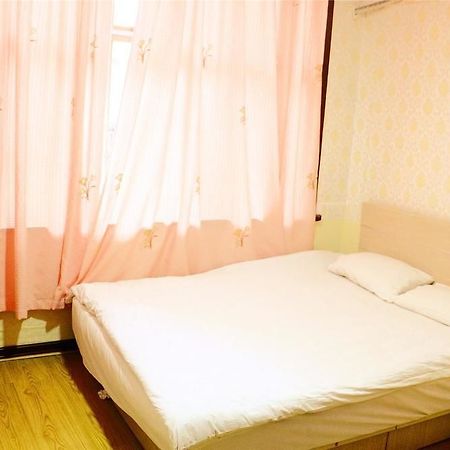Qingdao Peninsula Four Seasons Business Hotel Bagian luar foto