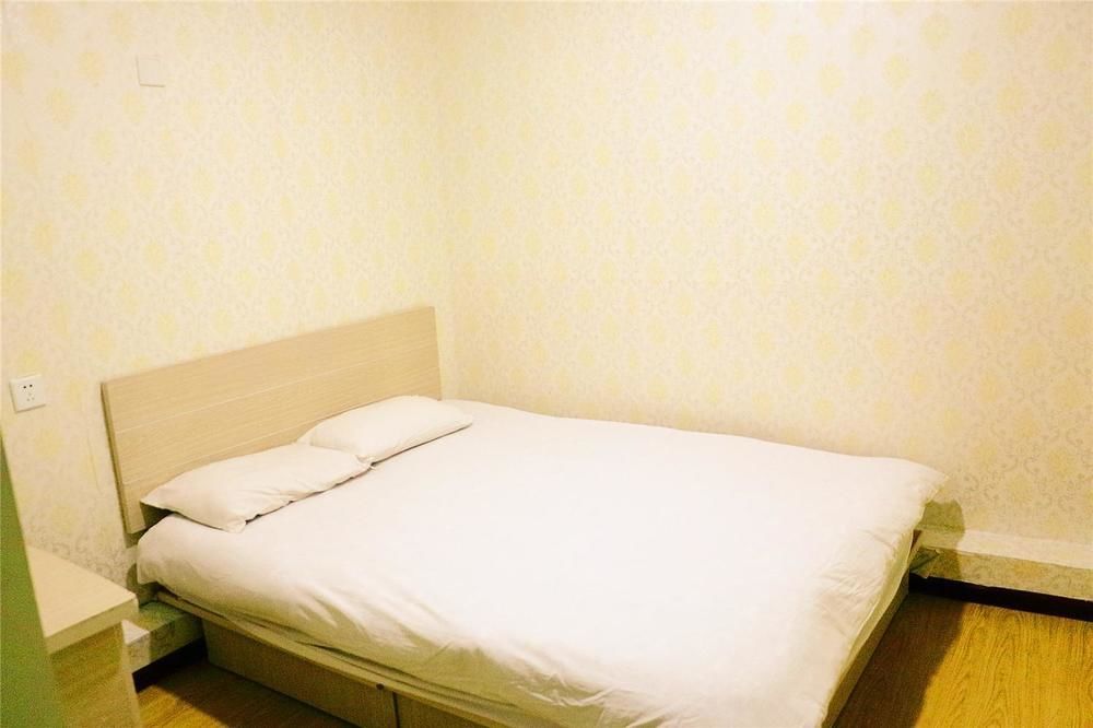 Qingdao Peninsula Four Seasons Business Hotel Bagian luar foto