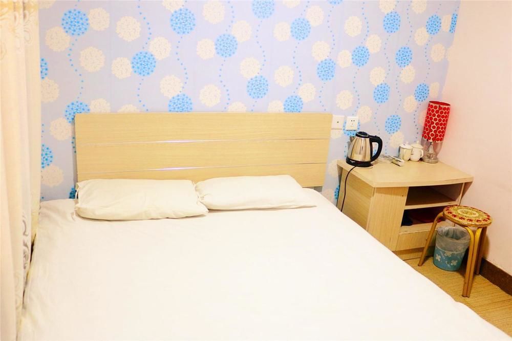 Qingdao Peninsula Four Seasons Business Hotel Bagian luar foto