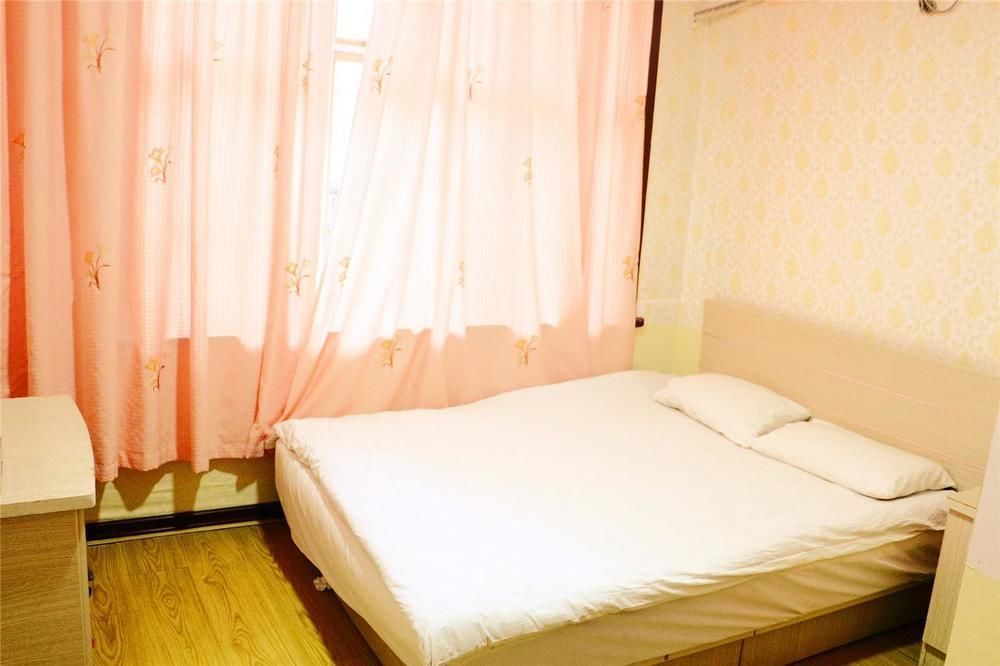 Qingdao Peninsula Four Seasons Business Hotel Bagian luar foto