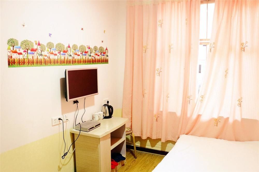 Qingdao Peninsula Four Seasons Business Hotel Bagian luar foto