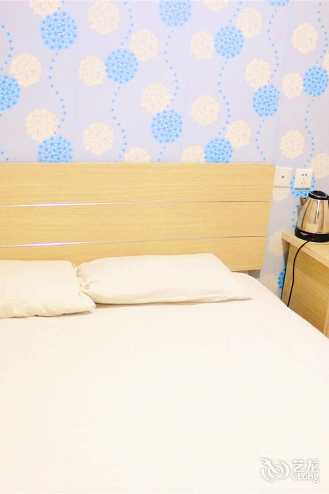 Qingdao Peninsula Four Seasons Business Hotel Bagian luar foto