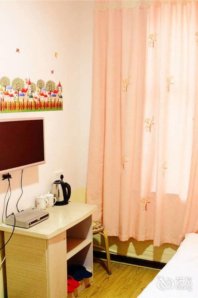 Qingdao Peninsula Four Seasons Business Hotel Bagian luar foto