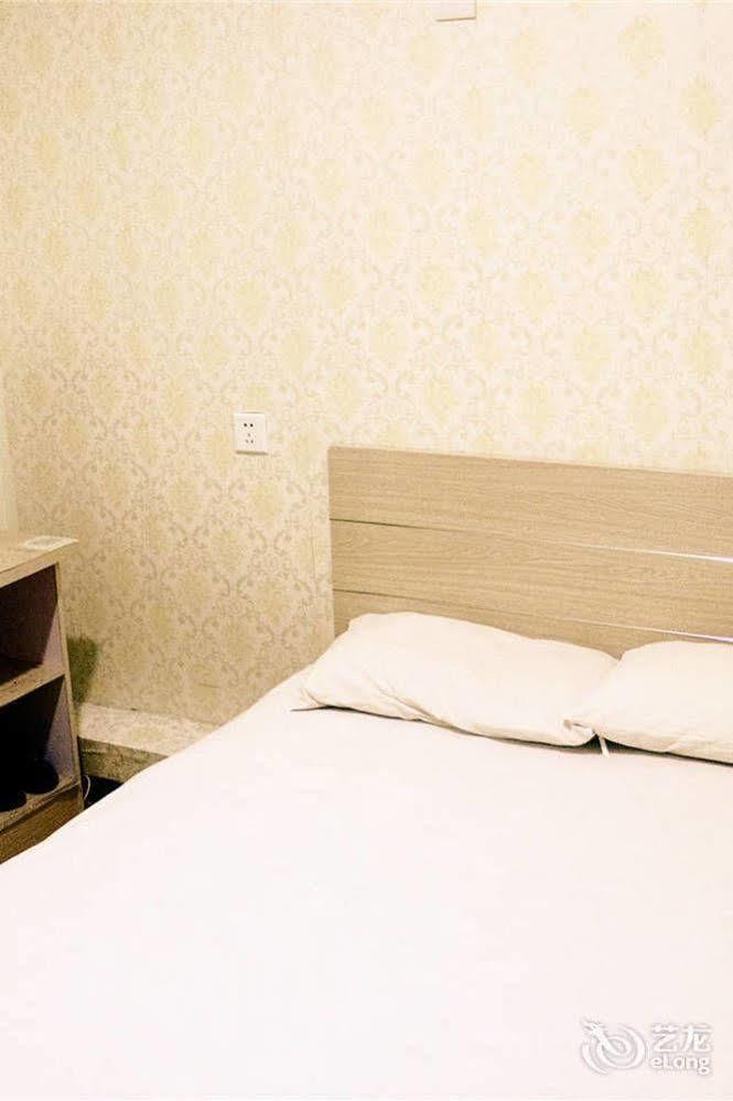 Qingdao Peninsula Four Seasons Business Hotel Bagian luar foto