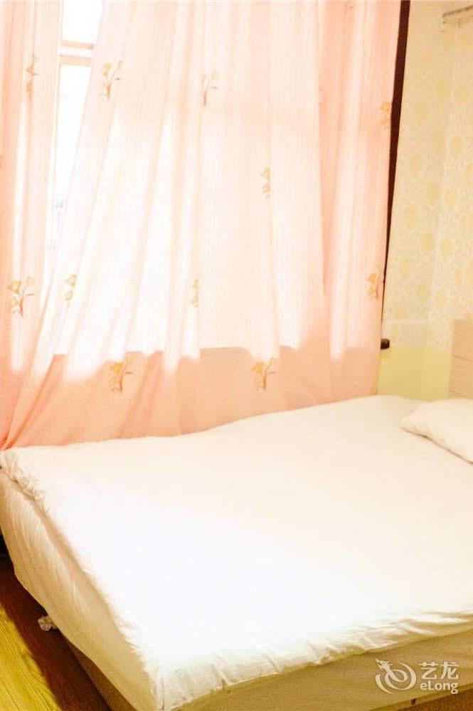 Qingdao Peninsula Four Seasons Business Hotel Bagian luar foto