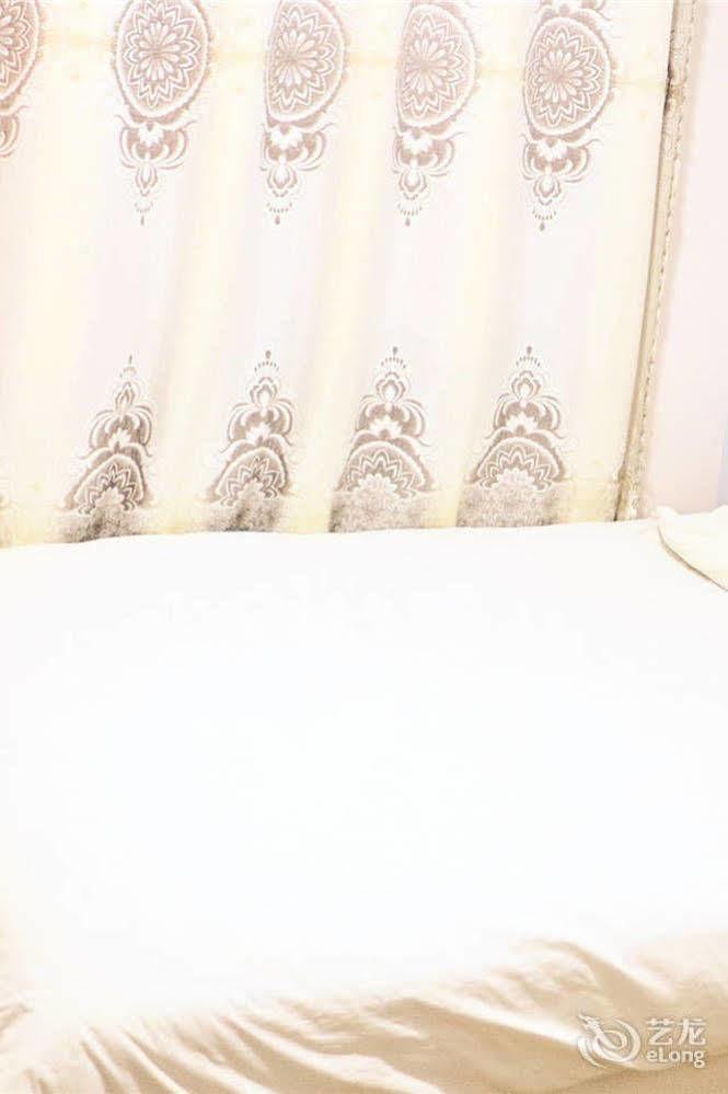 Qingdao Peninsula Four Seasons Business Hotel Bagian luar foto